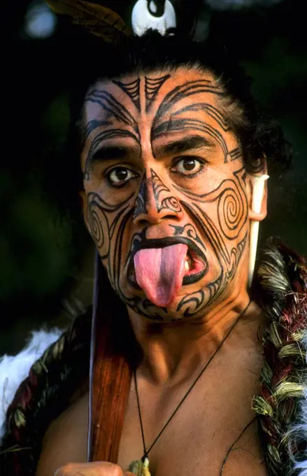 Maori Native Man With Tattoos And Body Paint Near Rotorua, New Zealand