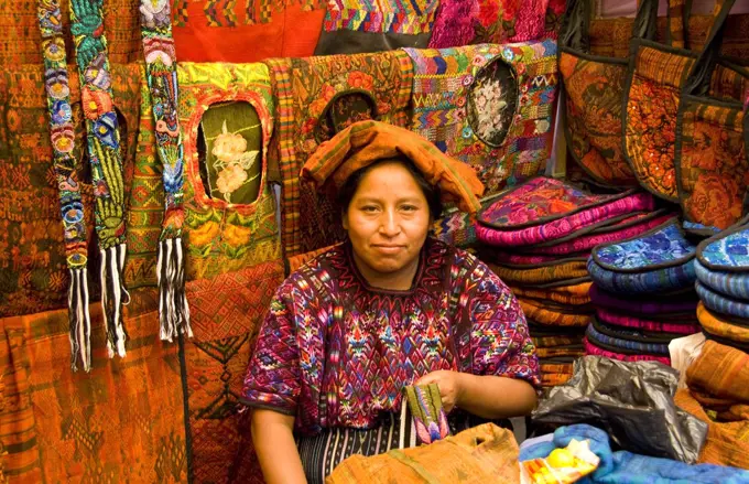 Woman Selling Artwork In Chichicastenango, Guatemala