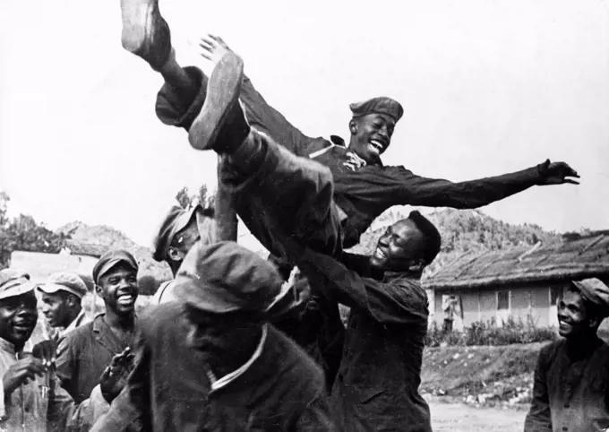 Korean War. African American prisoners in a North Korean POW camp celebrating upon hearing news of the armistice. August 1953.