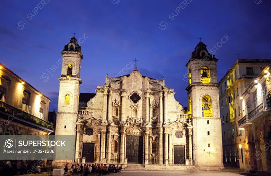 Cuba Havana Plaza de la Catedral de San Cristobal de la Habana  at twilight with people at outdoor restaurant