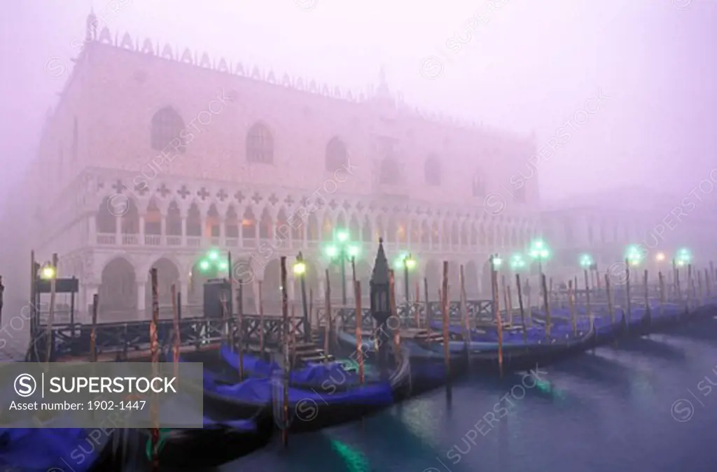 Italy Venice the Doges Palace and Moro San Marco in fog