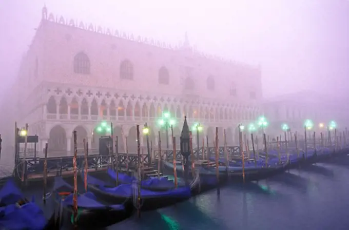 Italy Venice the Doges Palace and Moro San Marco in fog