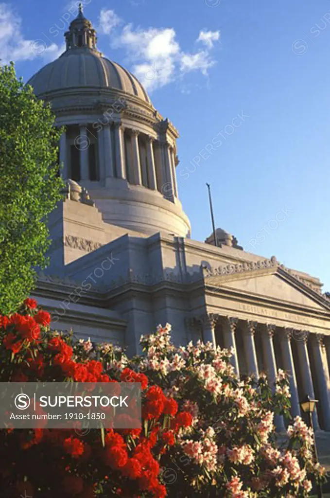 State Legislature building Olympia Washington with rododendron bushes in foreground USA Washington State