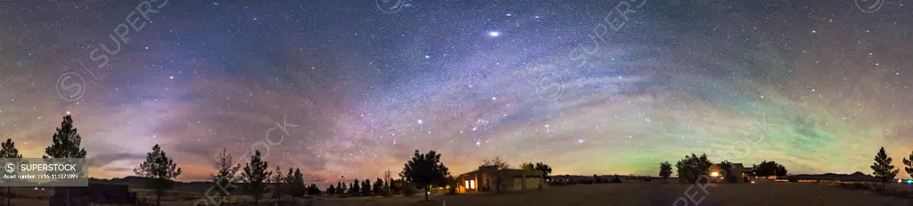 A 360° panorama taken in the pre-dawn hours (4:45 a.m.) on December 8, 2013, from the Painted Pony Resort in SW New Mexico. The panorama takes in, from left to right: Arcturus just on the treetop the zodiacal light rising up from the east red Mars embedded in the zodiacal light below Leo the Milky Way from Puppis and Canis Major at left arching up and across the sky down into Perseus at right Sirius the brightest star Orion setting over the main house Jupiter, the bright object at 