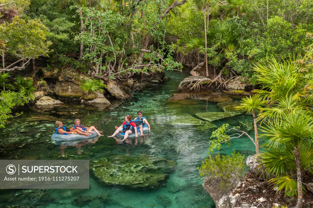 Rafting in the lagoon at Xel-Ha nature park, Riviera Maya, Mexico.