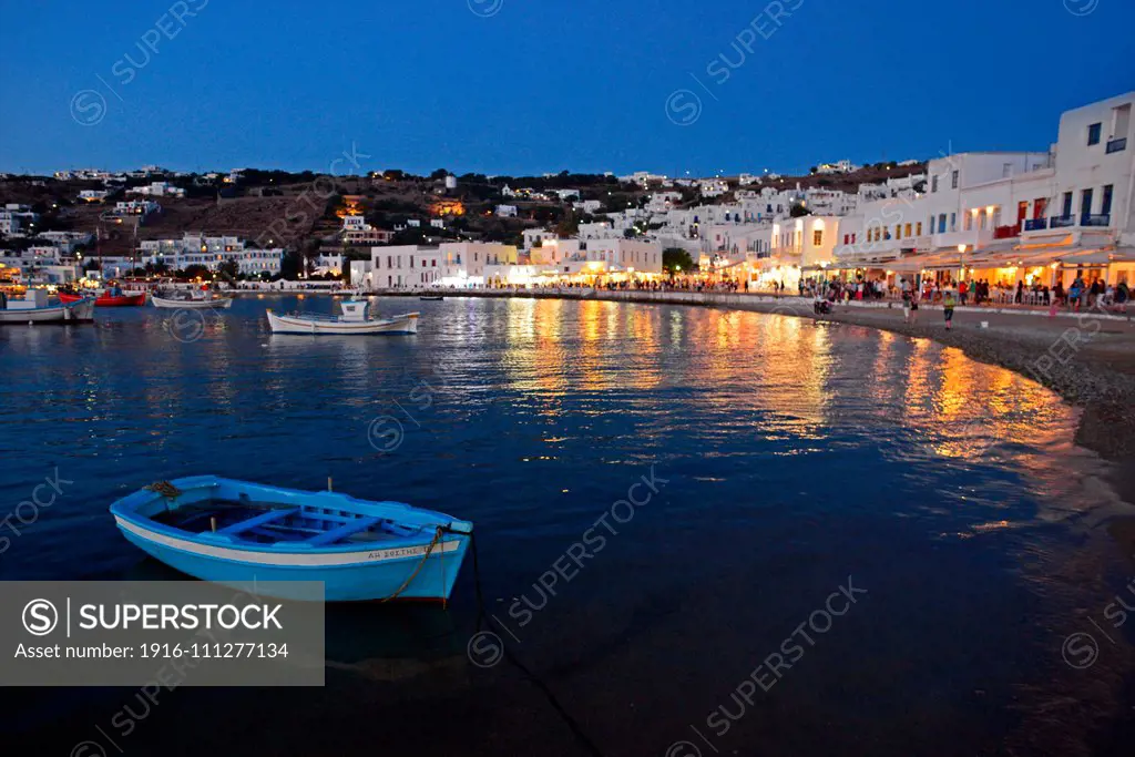 Fishing boats at night in Mykonos town, Greece