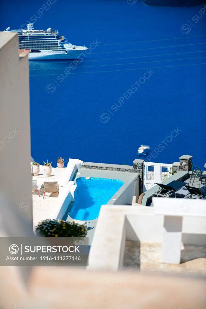 Building roofs and cruise ships in Fira, Santorini, Greek Islands, Greece