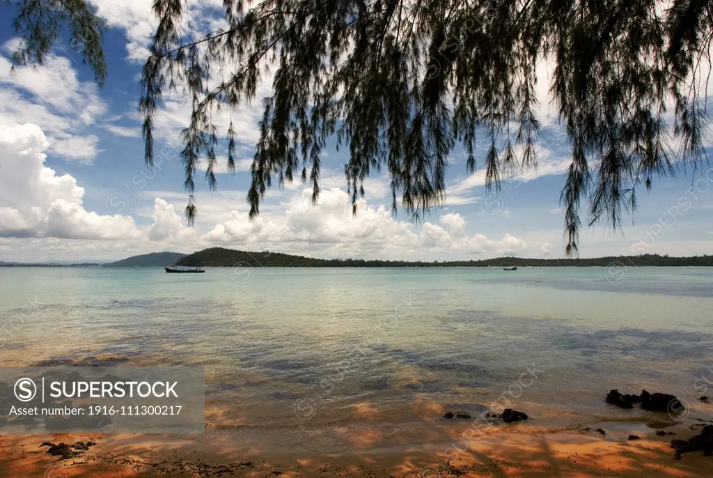 Beach on the island of Koh Russei. Koh Russei, also named Koh Russey or Bamboo Island is a green, gilt-edged crescent, resting on emerald or blue water. This is the island one always longed for, the archetype from your wildest dreams. Koh Russey is really a jewel of a beach with fine pink or ochre sand and a deep and mysterious forest. For those loving the sun falling into the sea whilst surrounded by jungle sounds, Koh Russey is the place. An island of gentleness. Its virgin, private and intima