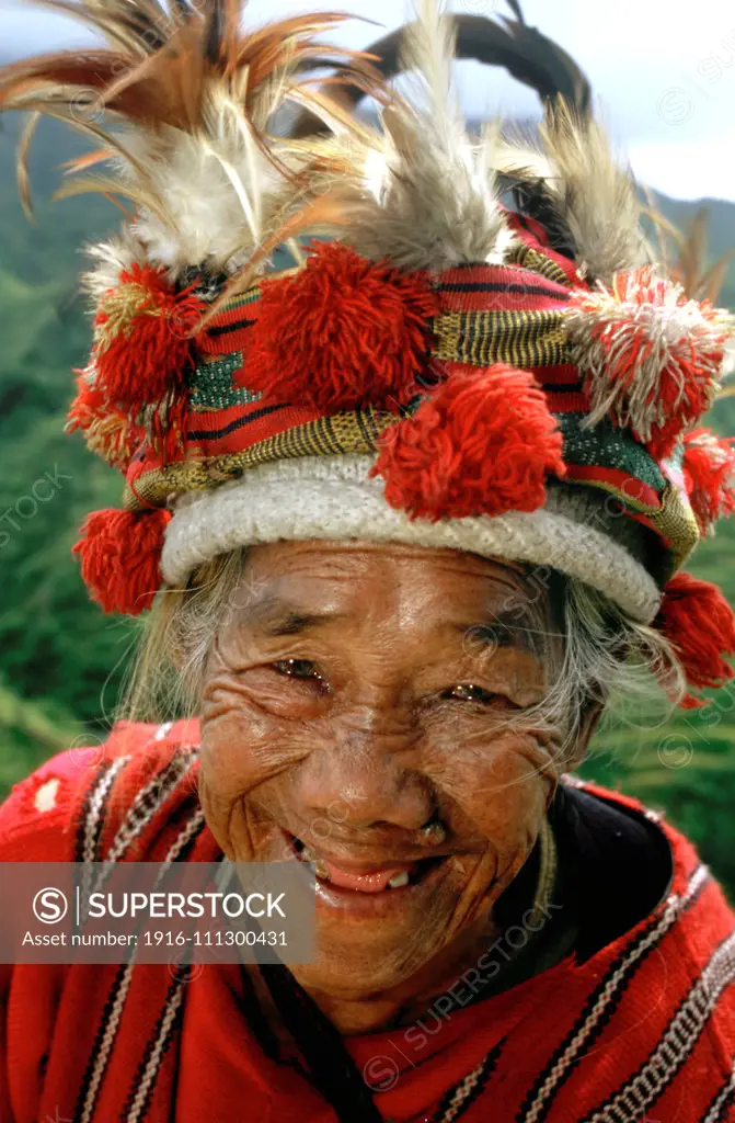 Women of the Ifugao tribe. Rice terraces. View point. Banaue. Northern Luzon. Philippines. Banaue (or alternatively spelled as Banawe) is a fourth class municipality in the province of Ifugao, Philippines. According to the 2010 census, it has a population of 22,365 people.3 It is widely known as the site of the UNESCO World Heritage Site, the Batad Rice Terraces and Bangaan Rice Terraces. Sometimes called by locals as the "Eighth Wonder of the World", the Ifugao Rice Terraces begin at the base