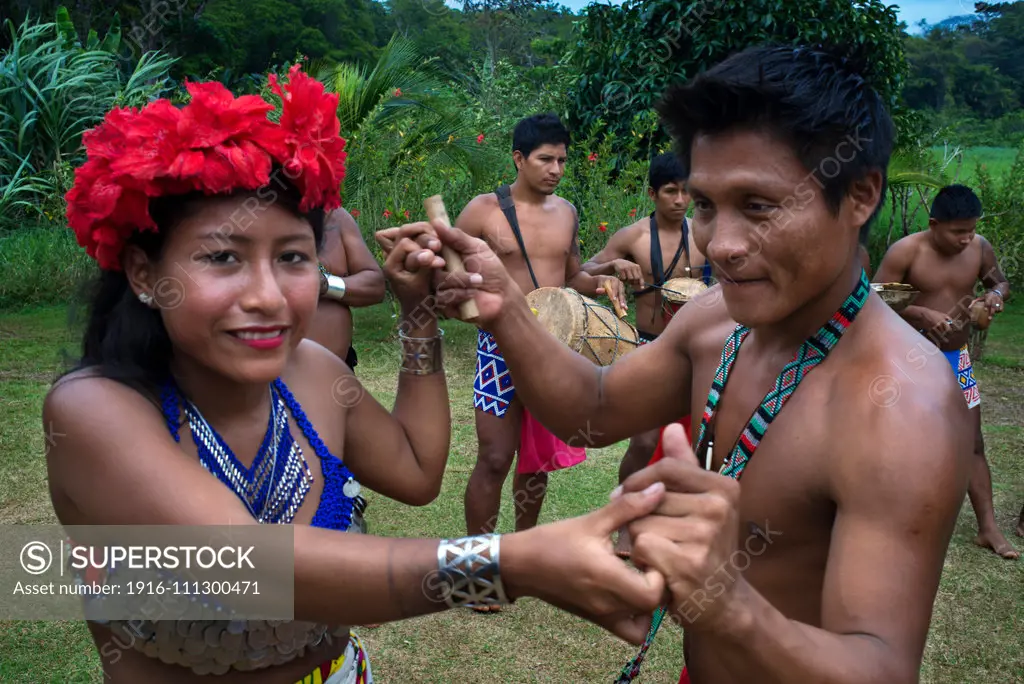 Music and dancing in the village of the Native Indian Embera Tribe, Embera Village, Panama. Panama Embera people Indian Village Indigenous Indio indios natives Native americans locals local Parque National Chagres. Embera Drua. Embera Drua is located on the Upper Chagres River. A dam built on the river in 1924 produced Lake Alajuela, the main water supply to the Panama Canal. The village is four miles upriver from the lake, and encircled by a 129.000 hectare National Park of primary tropical rai