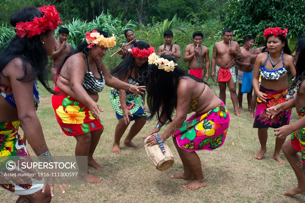 Music and dancing in the village of the Native Indian Embera Tribe, Embera Village, Panama. Panama Embera people Indian Village Indigenous Indio indios natives Native americans locals local Parque National Chagres. Embera Drua. Embera Drua is located on the Upper Chagres River. A dam built on the river in 1924 produced Lake Alajuela, the main water supply to the Panama Canal. The village is four miles upriver from the lake, and encircled by a 129.000 hectare National Park of primary tropical rai