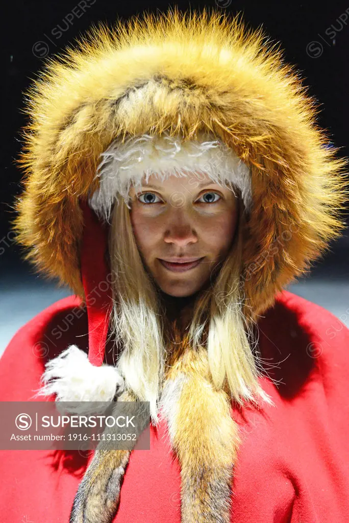 Cute blonde woman dressed as an elf. Lapland, Finland