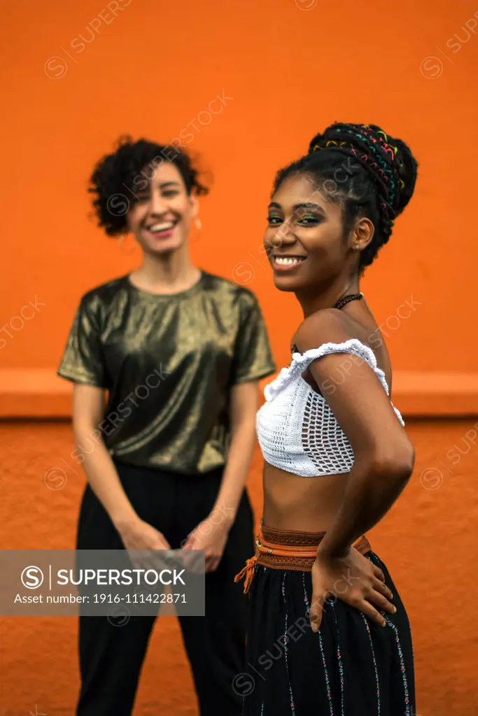 Two latin young women in the streets of Cali, Colombia