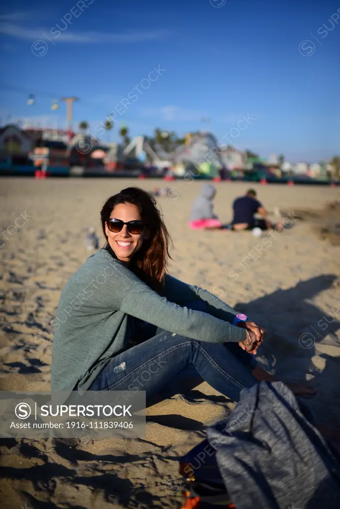 Young woman in Santa Cruz State beach, California.