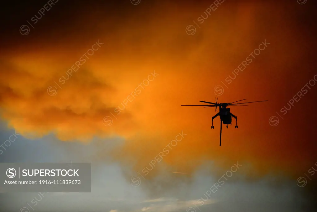 Helicopter fighting wildfire in Yosemite area, California, United Staes