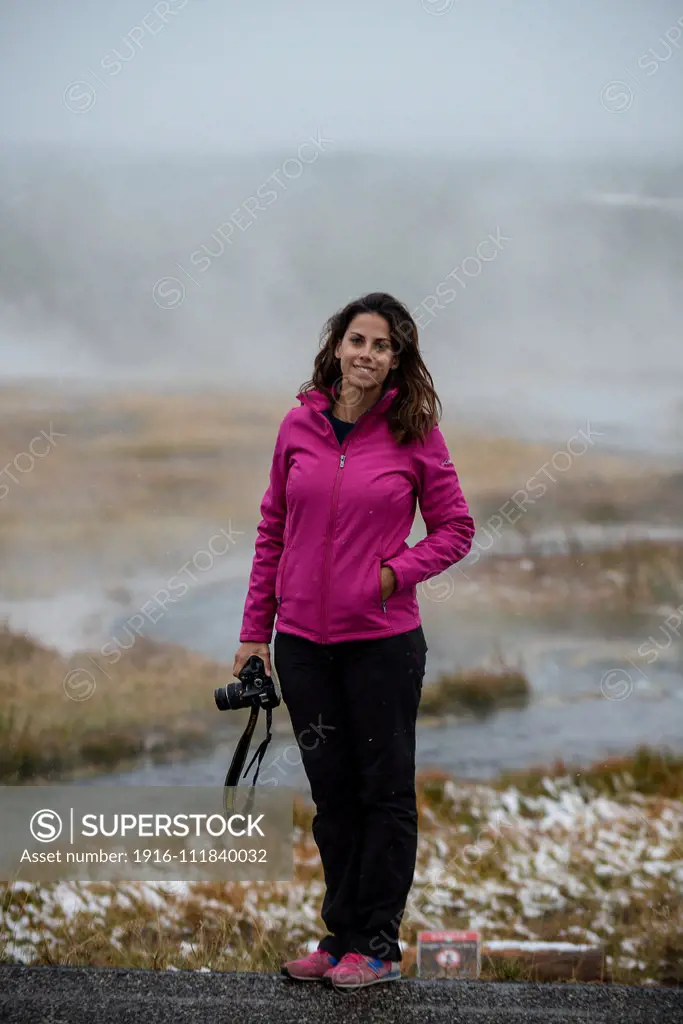 Female photographer in Yellowstone National Park, USA