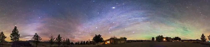 A 360° panorama taken in the pre-dawn hours (4:45 a.m.) on December 8, 2013, from the Painted Pony Resort in SW New Mexico. The panorama takes in, from left to right: Arcturus just on the treetop the zodiacal light rising up from the east red Mars embedded in the zodiacal light below Leo the Milky Way from Puppis and Canis Major at left arching up and across the sky down into Perseus at right Sirius the brightest star Orion setting over the main house Jupiter, the bright object at 