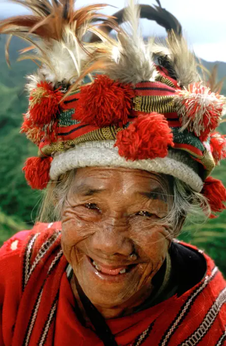 Women of the Ifugao tribe. Rice terraces. View point. Banaue. Northern Luzon. Philippines. Banaue (or alternatively spelled as Banawe) is a fourth class municipality in the province of Ifugao, Philippines. According to the 2010 census, it has a population of 22,365 people.3 It is widely known as the site of the UNESCO World Heritage Site, the Batad Rice Terraces and Bangaan Rice Terraces. Sometimes called by locals as the "Eighth Wonder of the World", the Ifugao Rice Terraces begin at the base