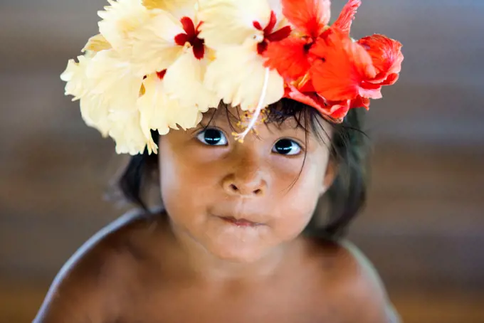 Portrait of native child embera in the village of the Native Indian Embera Tribe, Embera Village, Panama. Panama Embera people Indian Village Indigenous Indio indios natives Native americans locals local Parque National Chagres. Embera Drua. Embera Drua is located on the Upper Chagres River. A dam built on the river in 1924 produced Lake Alajuela, the main water supply to the Panama Canal. The village is four miles upriver from the lake, and encircled by a 129.000 hectare National Park of primar