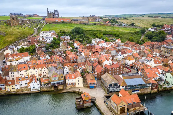 The iconic Whitby Abbey sits on the hill above the quaint English seaside town of Whitby, Yorkshire, United Kingdom.;The iconic Whitby Abbey sits on the hill above the quaint English seaside town of Whitby, Yorkshire, United Kingdom.