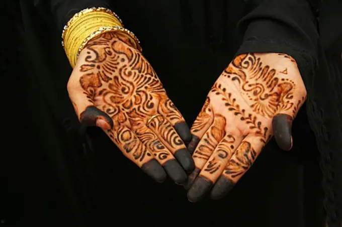 India Delhi hands of a muslim lady at Jam Masjid the Great Mosque of Delhi