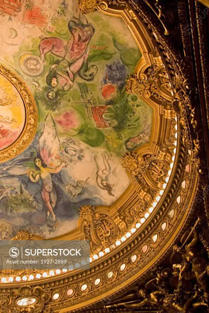 Portion of the Paris Opera House ceiling with its Marc Chagall mural showing amoung its figrues sights of Paris such as the Arch of Triumph and the Place de Concorde Paris France