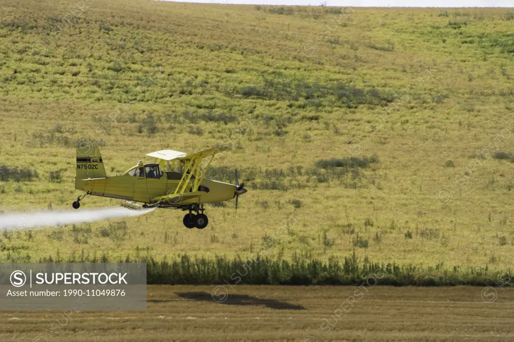 Crop duster in the palouse region of idaho.IDAHO USA