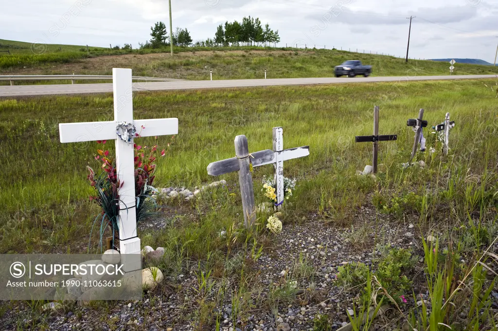 Roadside memorial crosses near Cochrane, Alberta, Canada.