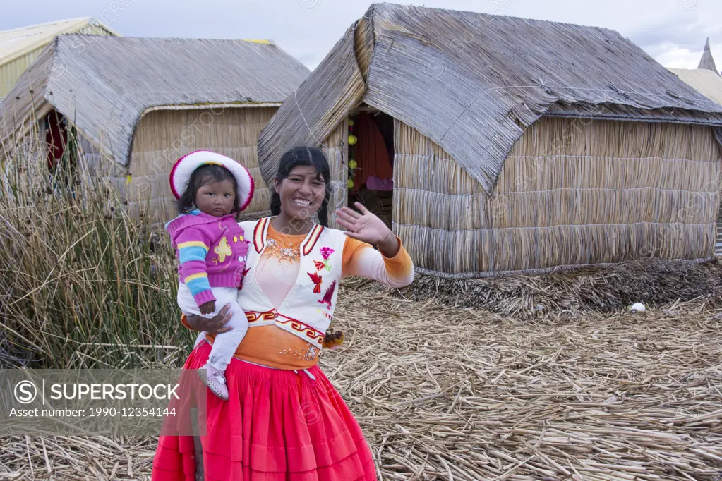 Local residents of floating reed islands of Uros, Lake Titicaca, Peru