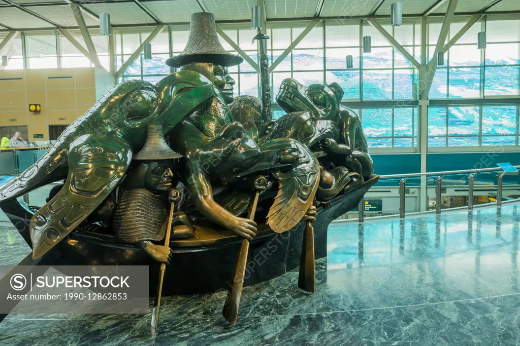 Cast bronze sculpture, The Spirit of Haida Gwaii, the Jade Canoe, by artist Bill Reid, Vancouver Airport, YVR, Richmond, British Columbia, Canada