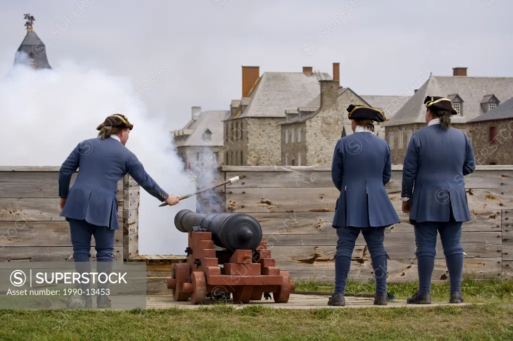 Soldier firing the cannon gun along the Quay at the Fortress of Louisbourg, Louisbourg National Historic Site, Highway 22, Fleur de lis Trail, Marconi...