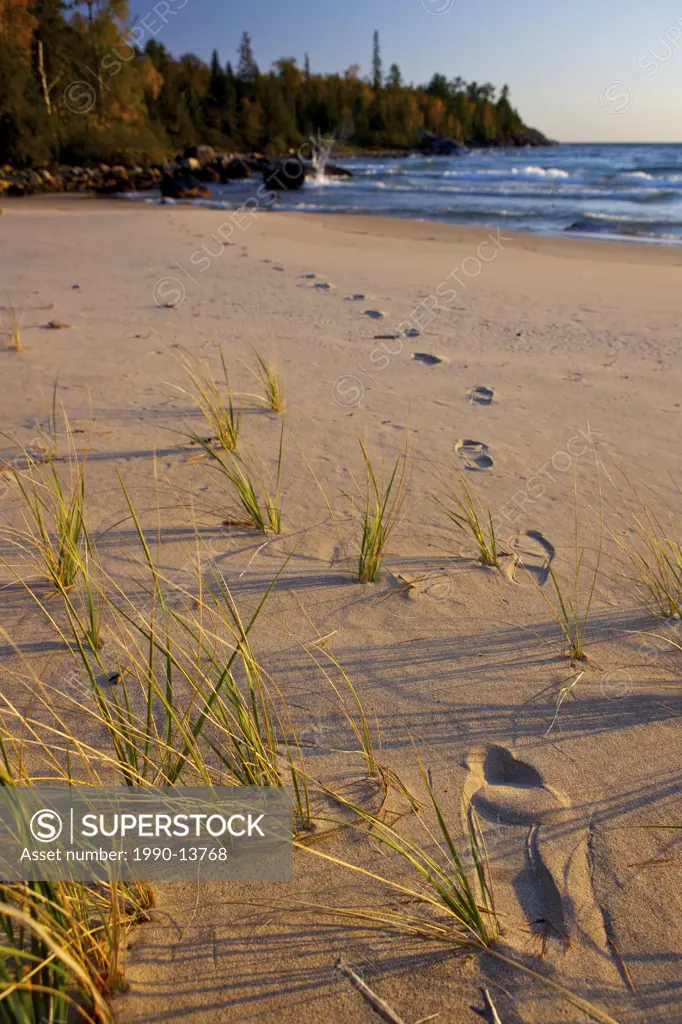 Footprints along the beach at Katherine Cove, Lake Superior, Lake Superior Provincial Park, Great Lakes, Ontario, Canada.