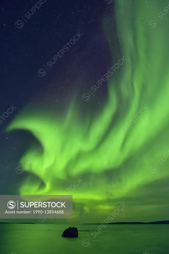 Aurora borealis (Northern lights) over Ennadai Lake, Arctic Haven Lodge, Ennadai Lake, Nunavut, Canada