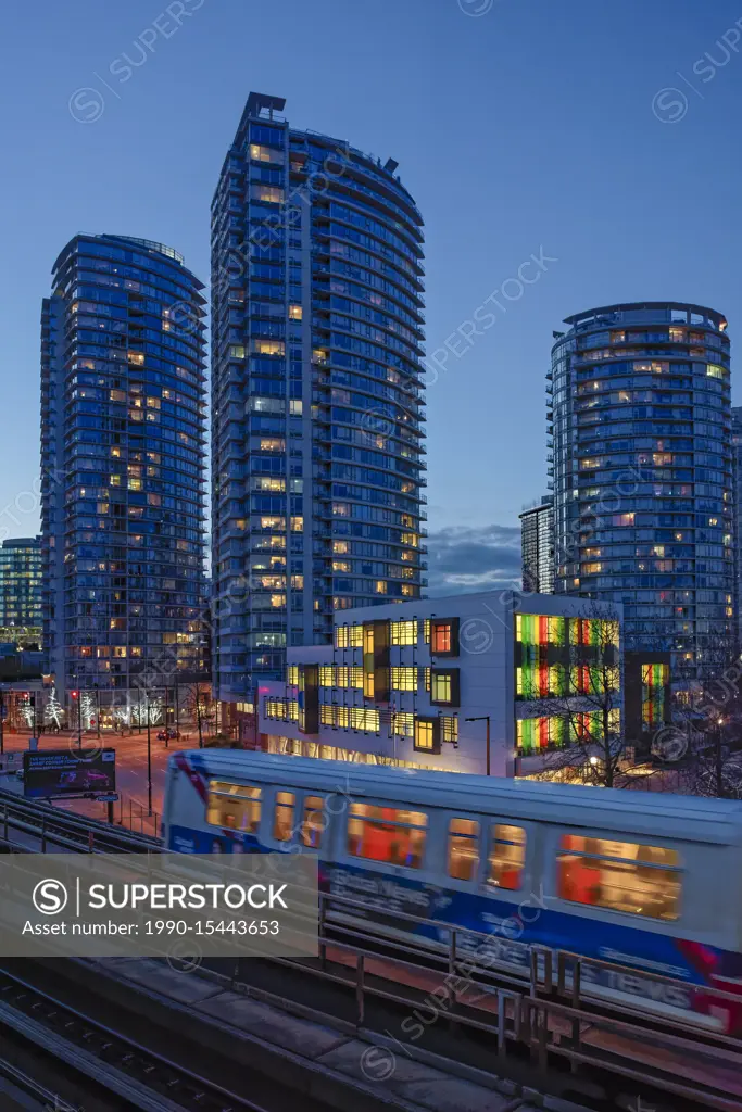 Skytrain rapid transit elevated rail, night time, Vancouver, British Columbia, Canada.