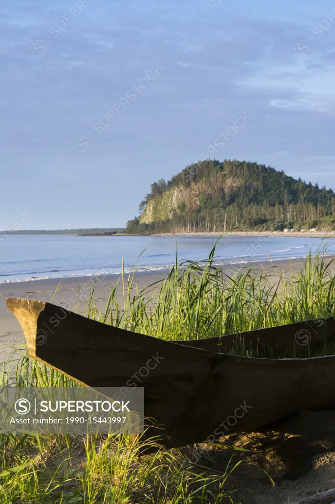 Haida dugout cedar canoe on Agate Beach, with Tow Hill shown, Haida Gwaii, formerly known as Queen Charlotte Islands, British Columbia, Canada