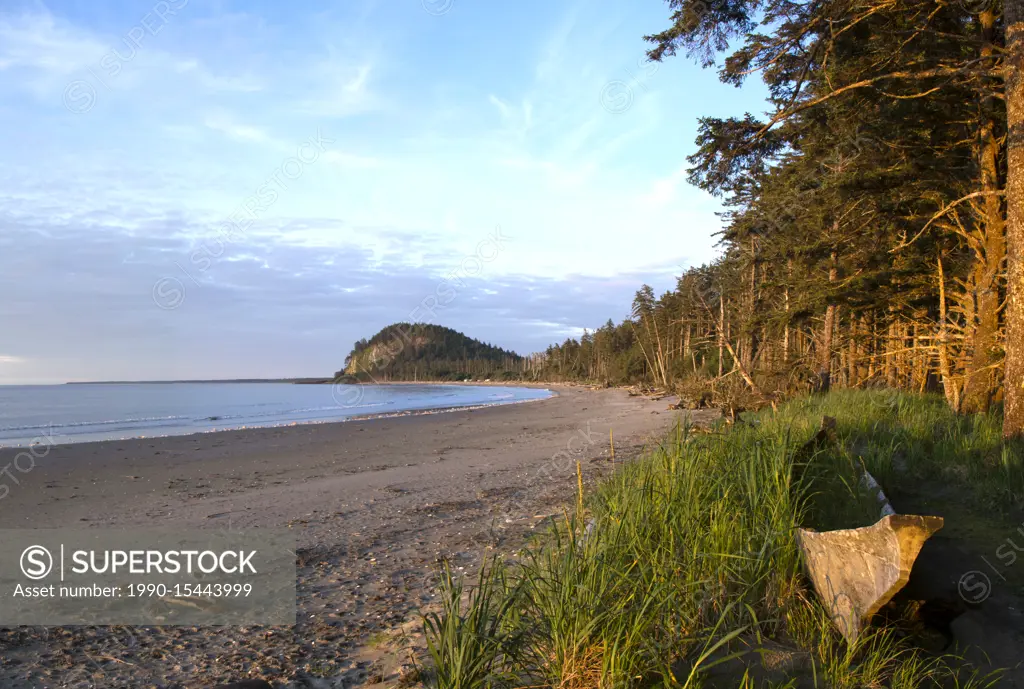 Haida dugout cedar canoe on Agate Beach, with Tow Hill shown, Haida Gwaii, formerly known as Queen Charlotte Islands, British Columbia, Canada