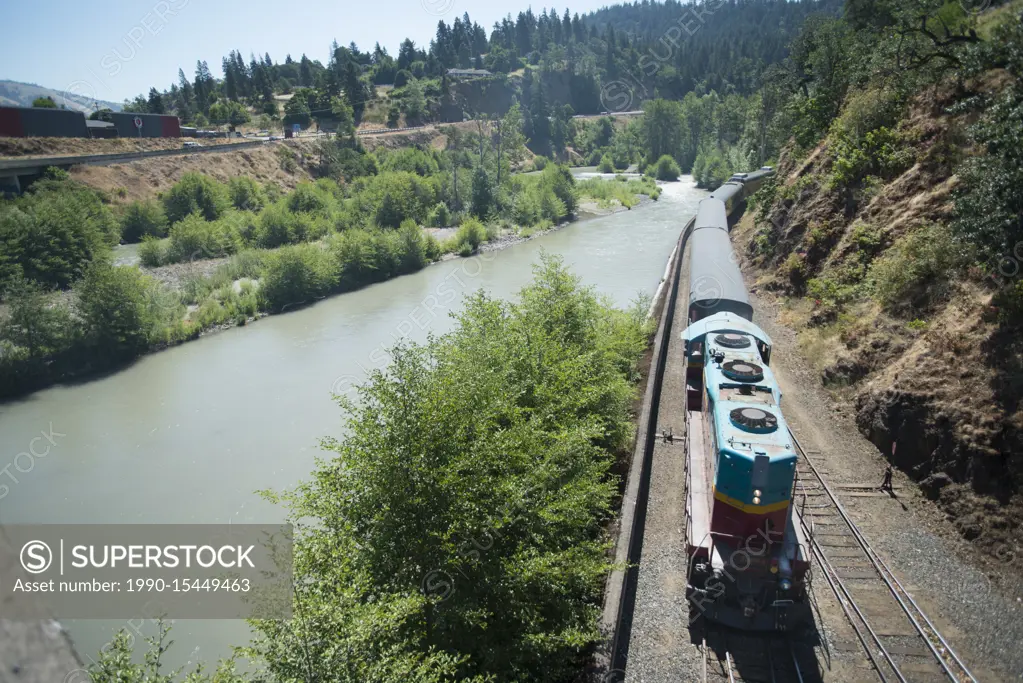 The Mount Hood Scenic Railroad alongside Hood River, Oregon, USA