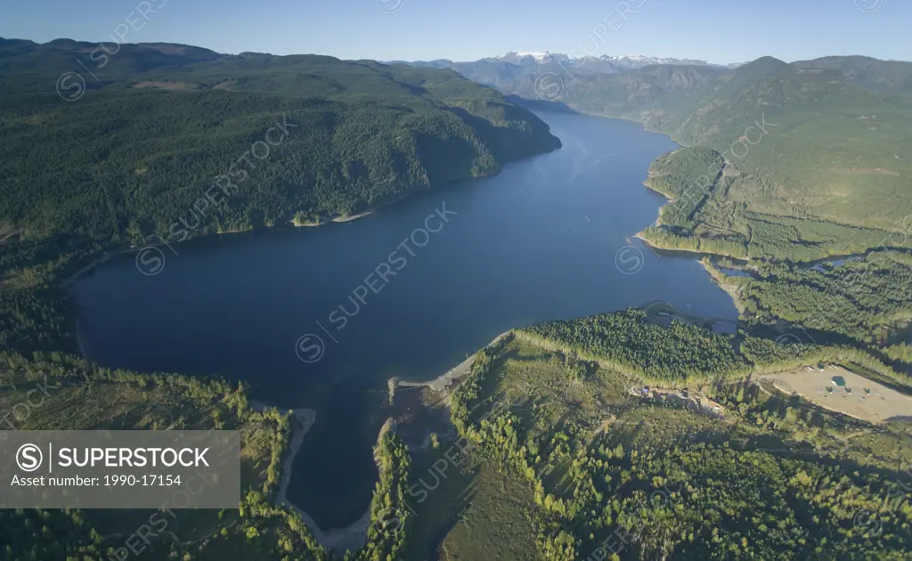 An aerial view of comox lake, the comox glacier and surrounding mountains. Comox Valley, Vancouver Island, British Columbia, Canada.