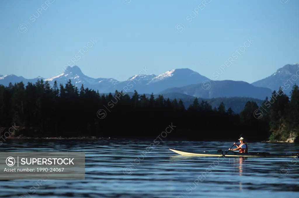 sea kayaker at Breton Islands, near Quadra Island, British Columbia, Canada