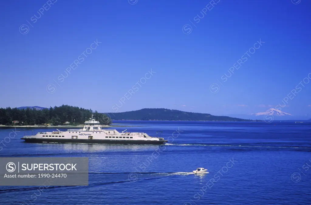 BC Ferries in Gulf Islands with Mount Baker in background, Vancouver, British Columbia, Canada