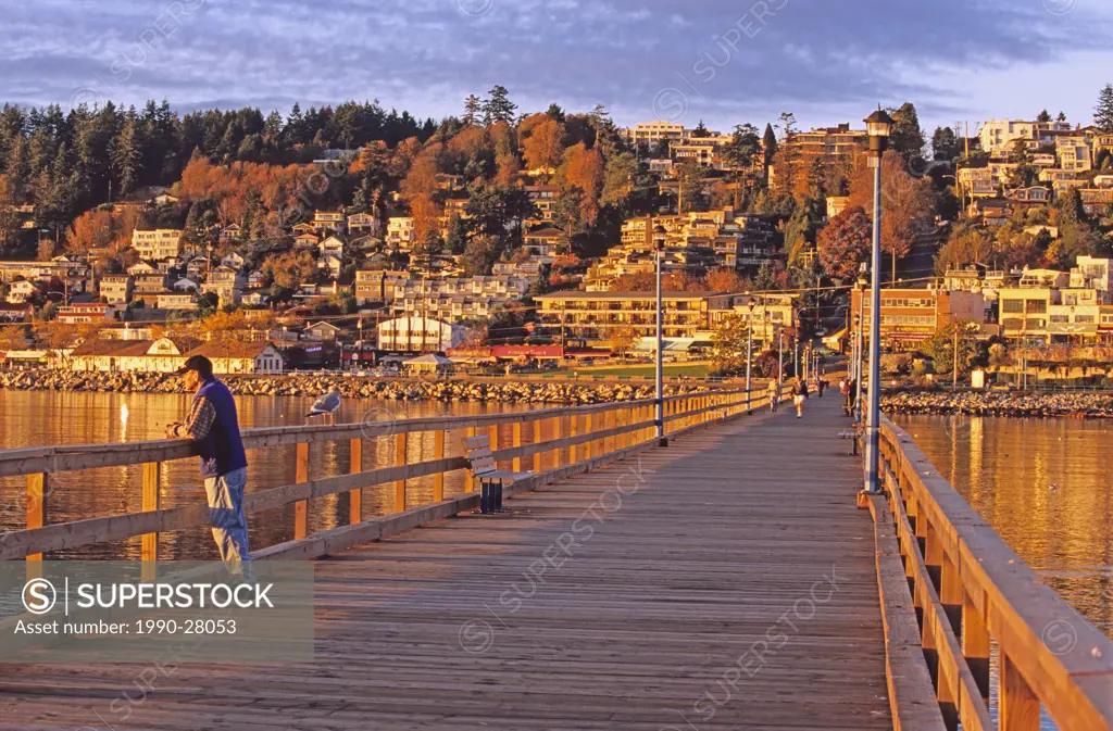 Sunset light on White Rock pier, 500 metres long, built in 1913 as a steamship landing dock, White Rock, British Columbia, Canada