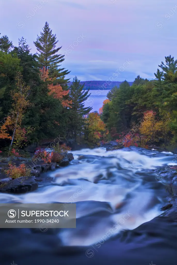 Sunrise at Lower Rosseau Falls on the Rosseau River as it approaches Lake Rosseau in Ontario´s Muskoka Region near Rosseau Ontario