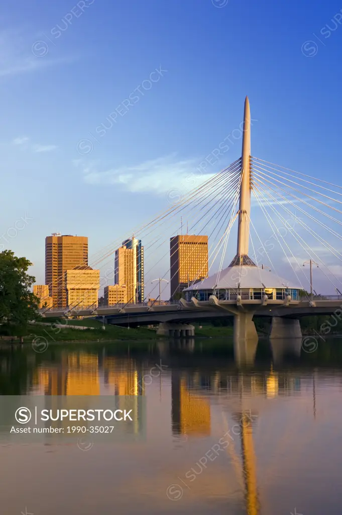 Winnipeg skyline showing esplanada Riel foot bridge, from St. Boniface, Manitoba, Canada