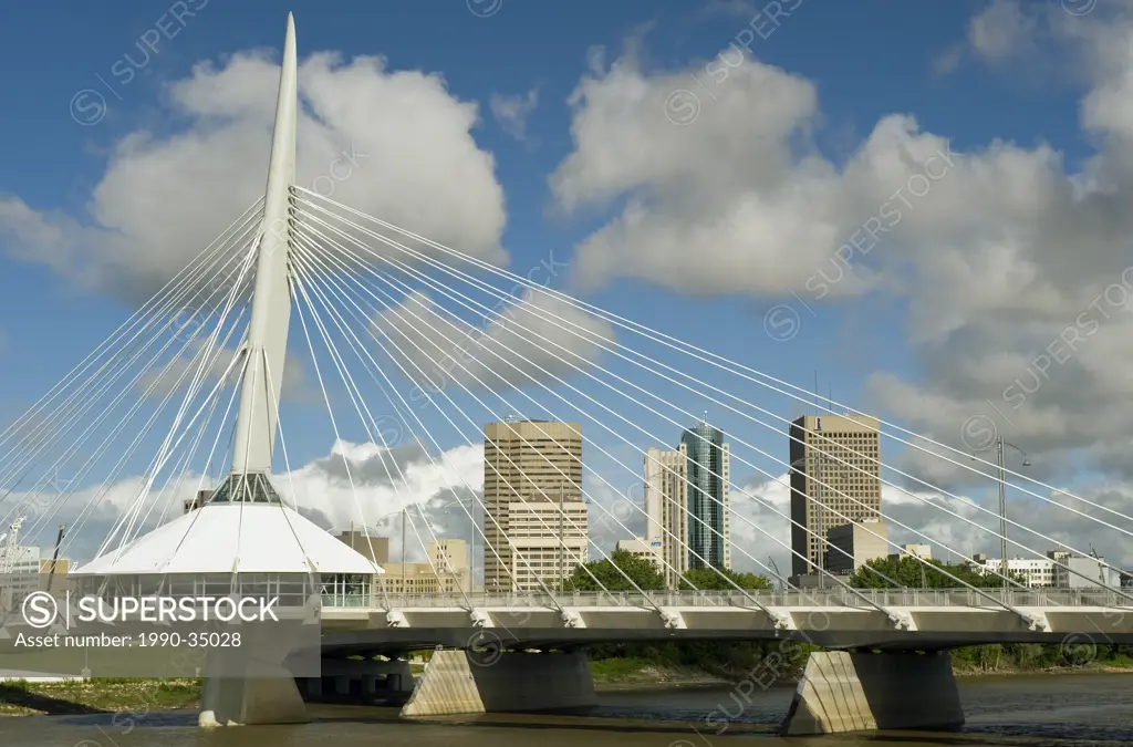 Winnipeg skyline from St. Boniface showing Esplanade Riel Bridge across the Red River, Manitoba, Canada