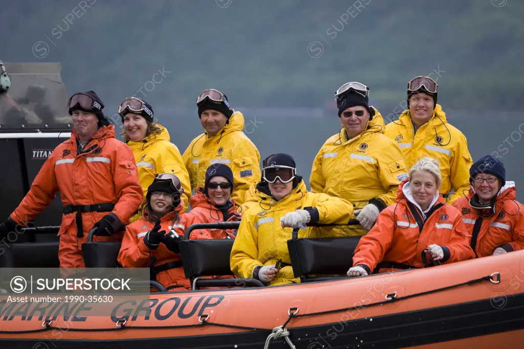 A group of happy tourists aboard a Rapids tour with Oak Bay Marine Group take a break before heading back into the turbulant waters again for more fun...