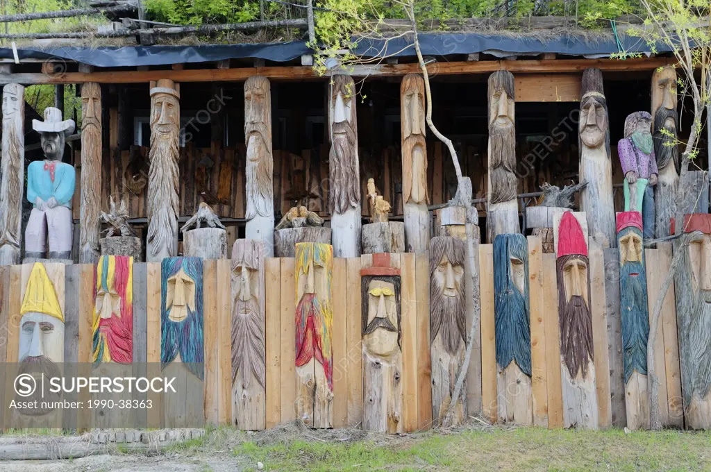 Chainsaw artist Rolf Heer´s ´Home of a Thousand Faces´ colourful sculptures at Radium Hot Springs, British Columbia, Canada.