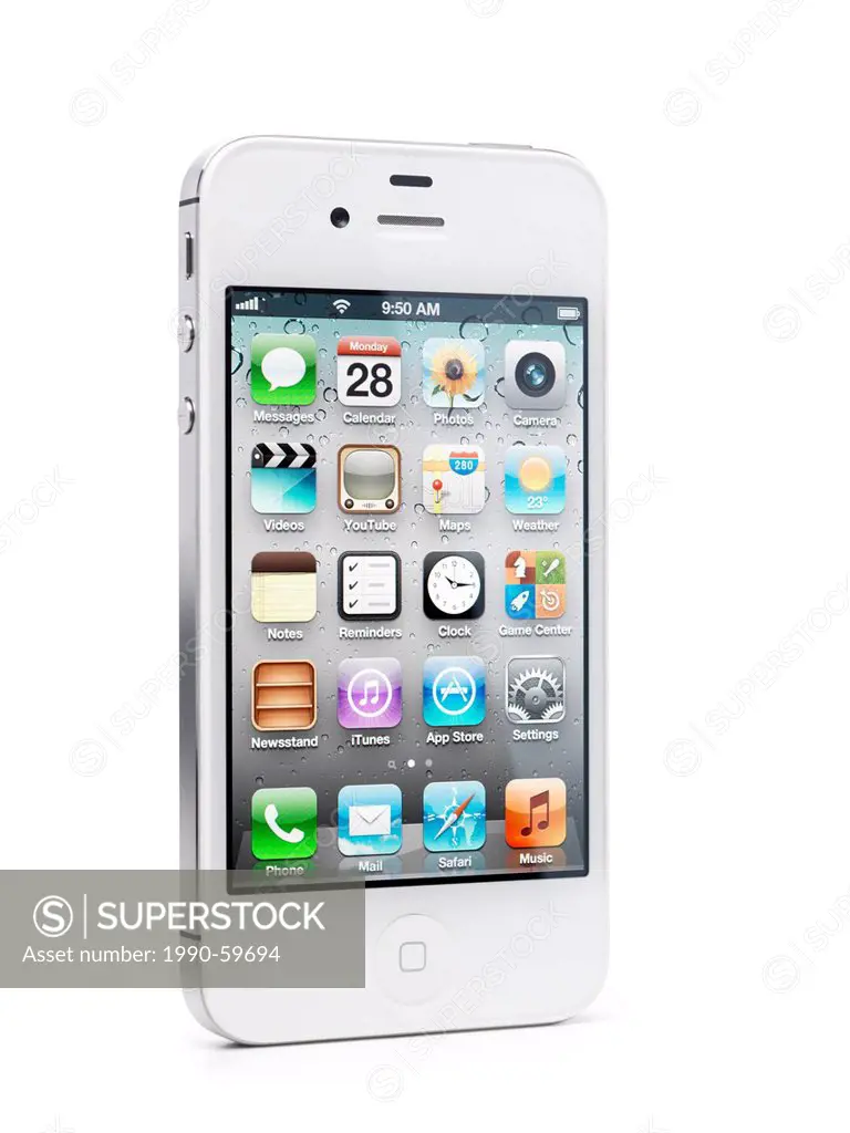 White iPhone 4s Apple smartphone with desktop icons on its display standing at an angle. Isolated on white background with clipping path.