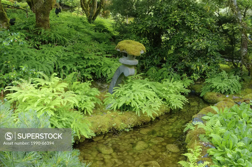 Stone lantern aka ishidoro, in the Japanese Garden, Butchart Gardens, Brentwood Bay, Vancouver Island, British Columbia, Canada