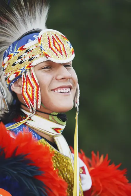 Blackfoot blood male dancer in traditional mens fancy dance outfit, Fort McLeod, Lethbridge, Alberta, Canada.