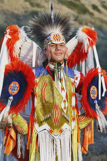 Blackfoot Blood s man in traditional mens fancy dance outfit, Fort McLeod, Lethbridge, Alberta, Canada.